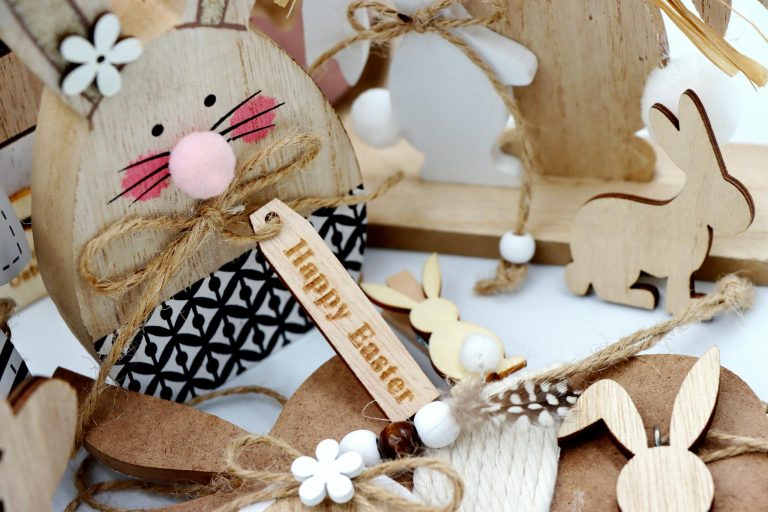Close-Up of a Happy Easter Wooden Bunny with Easter Decorations